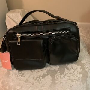 Wet seal  ladies crossed body bag.